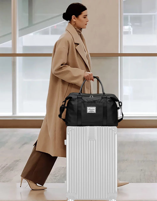 Load image into Gallery viewer, 37L Waterproof Duffle Bag for Women, Tear-Resistant Gym Travel Bag with Adjustable Shoulder Strap &amp; Trolley Sleeve, Airline Approved Carry-On Weekender Bag with Wet/Dry Pocket, Black
